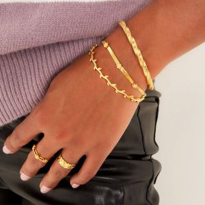 Damen Armband kleine Blumen aus mit Gelbgold beschichtetem Edelstahl mit Zirkonsteinen