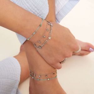 Damen Armband Sternanhnger aus mit Weigold beschichtetem Edelstahl